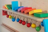 Тактильное оборудование и панели + Тактильно-развивающая панель “Разноцветное домино” (12 домино, настенный модуль)